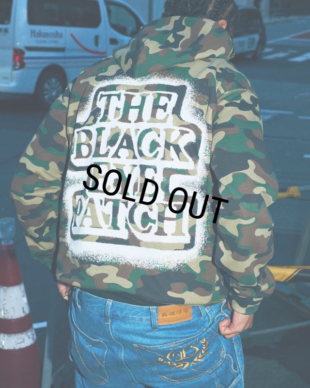 ブラックアイパッチ 迷彩パーカー SPRAYED OG LABEL HOODIE BlackEyePatch/SPRAYED OG LABEL HOODIE（BLACK） - JONAS