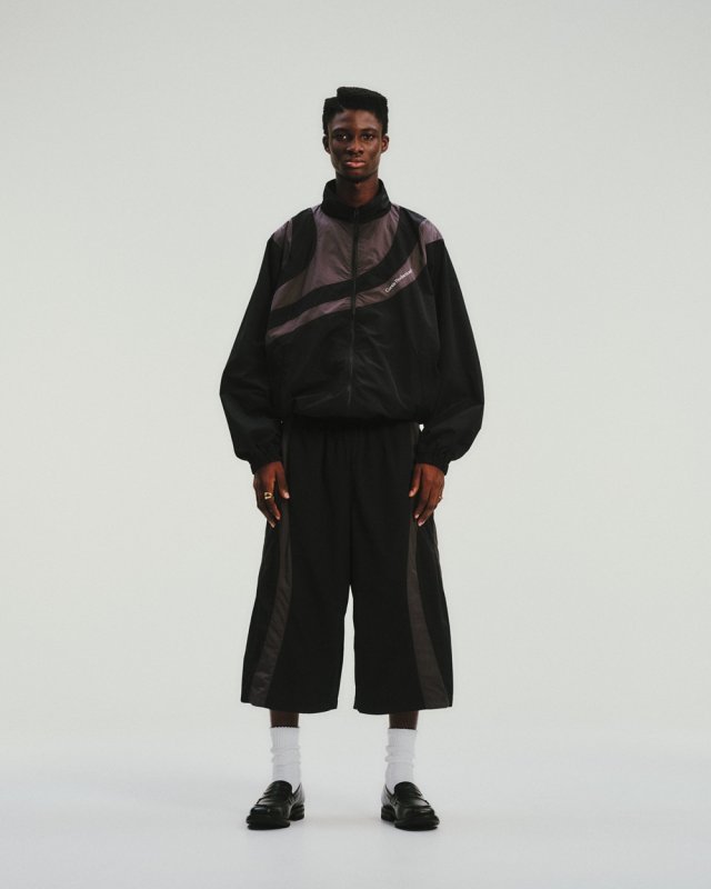 パンツ COOTIE / Nylon Shin Cut Wide Track Pants COOTIE PRODUCTIONS/Nylon Paneling Shin Cut Wide Track Pants（Navy